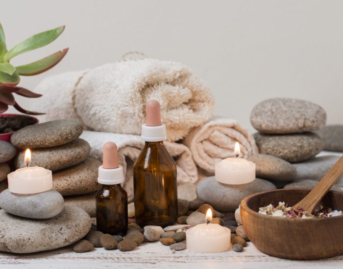 arrangement-with-spa-stones-lit-candles
